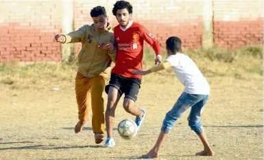  ?? — AFP ?? Boys at Egypt’s Nagrig village, where Mohamed Salah was born, have wholeheart­edly taken to football with the hope of becoming as big a name as the Liverpool star.