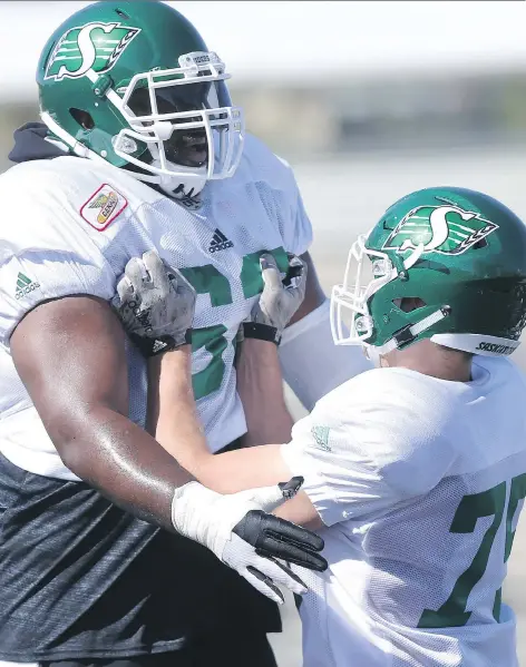  ?? MICHELLE BERG ?? Willie Jefferson, left, has been a defensive force for the Riders early in training camp and could be in for a monster year. Last season, he had eight tackles and three sacks in five games.
