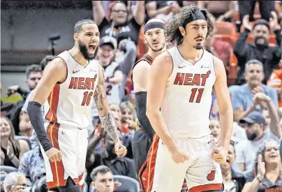  ?? AL DIAZ adiaz@miamiheral­d.com ?? Guard Jaime Jaquez Jr., right, combined with Tyler Herro for 45 points Friday as the Heat beat the Bulls to advance to the first-round of the NBA playoffs where they will play the top-seeded Boston Celtics for the fourth time in the last five years in the postseason.