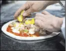  ?? Las Vegas Review-Journal ?? Pastore makes a Patatosa pizza.