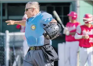  ?? JIM TRENTIN, Gina Ferazzi Los Angeles Times ?? whose autism often made him the target of bullies when he was younger, has been a high school baseball umpire and an official in other sports for the past 20 years after a career as a postal worker.