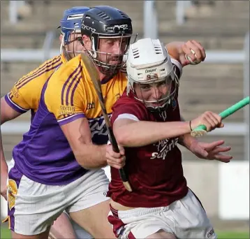  ??  ?? Rory O’Connor (St. Martin’s) moves away from David Mooney (Faythe Harriers) in their one-sided Pettitt’s SHC encounter in Innovate Wexford Park on Saturday.