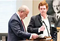  ?? (Jeff Blake/The State via AP, Pool) ?? Buster Murdaugh, right, the son of Alex Murdaugh, listens to a question from defense attorney Jim Griffin while testifying during his father's trial on Tuesday at the Colleton County Courthouse in Walterboro, S.C. The 54-year-old attorney is standing trial on two counts of murder in the shootings of his wife and son at their Colleton County, S.C., home and hunting lodge on June 7, 2021.