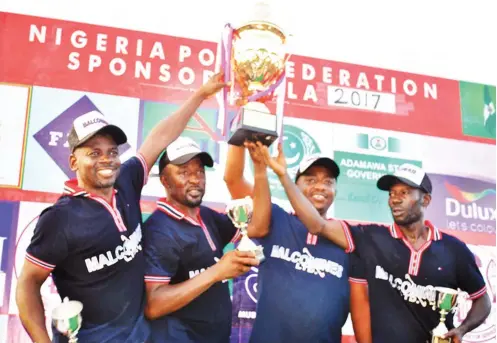  ?? Jos Malcomines Polo team Patron, Murtala Laushi (2nd from right) and his teammates showcase the Governor’s Cup they won last September in Yola. Malcomines is set to defend the Governor’s Cup title they won in Jos last year. ??