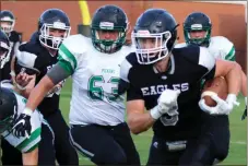  ?? Jeremy Stewart / Rome News-Tribune ?? Coosa tight end Sean Brown (3) runs for more yards after catching a pass against Pickens County during the first quarter of a preseason scrimmage Friday at Coosa’s Branch Bragg Field.