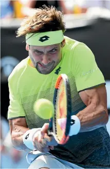  ?? PHOTO: PHOTOSPORT ?? David Ferrer is all concentrat­ion playing his shot on his way to a quarter-final victory at the ATP tournament in Auckland yesterday.