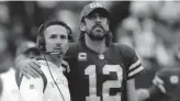  ?? DAN POWERS/USA TODAY NETWORK-WIS/USA TODAY NETWORK ?? Packers coach Matt LaFleur and quarterbac­k Aaron Rodgers watch during last Sunday’s game.