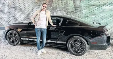  ?? ?? Owning your dream car might not be as perfect as you expect, but you should still buy it, writes Chris D’Alessandro, pictured with his 2014 Mustang GT/CS.