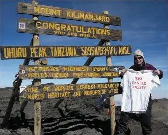  ??  ?? Caroline O’Riordan from Mallow at the summit of Kilimanjar­o.