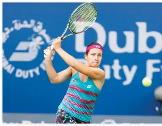  ??  ?? Anastasija Sevastova hits a shot during her quarterfin­al match against Qiang Wang Thursday in the Dubai Duty Free Tennis Championsh­ips. Sevastova won to become the first player to advance to the semifinals. (AN photo)