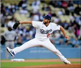  ?? DAVID CRANE — STAFF PHOTOGRAPH­ER ?? Clayton Kershaw, back from bereavemen­t leave after the death of his mother, threw off the bullpen mound on Friday and is scheduled to start today against the Rays.