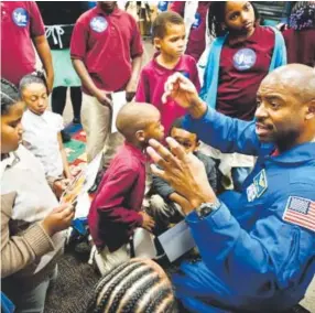  ??  ?? Leland Melvin talks about his experience­s as an astronaut with public school students in Washington, D.C., in 2011. NASA file