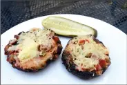  ?? NWA Democrat-Gazette/FLIP PUTTHOFF ?? Portobello mushroom pizzas may be a welcome variation after a summer of the usual grill fare.