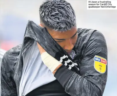  ??  ?? It’s been a frustratin­g season for Cardiff City goalkeeper Neil Etheridge