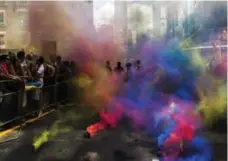  ?? MARK BLINCH/THE CANADIAN PRESS FILE PHOTO ?? Rainbow colours symbolize inclusion for the gay community. Excluding police is a step back to the fractured days of AIDS, Rosie Dimanno writes.