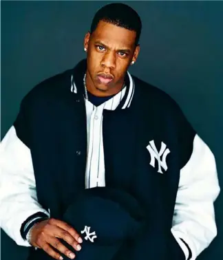  ??  ?? In 2003, Jay-Z in his Yankee outfit