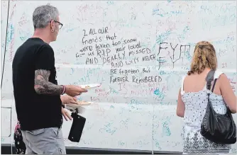  ?? MATHEW MCCARTHY WATERLOO REGION RECORD ?? Messages of encouragem­ent and remembranc­es of loved ones, written on a harm-reduction van, were on display during an event to mark Internatio­nal Overdose Awareness Day at Dickson Park in Cambridge.