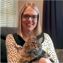  ?? KAROLINE TUCKEY, WARWICK SMITH/STUFF ?? Kat Littlewood – with Malibu – is researchin­g ways vets can give better advice about the euthanasin­g of pets.