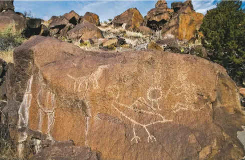  ??  ?? A tailed flute player (right) serenades a figure with horns, a large bird, and a dog; photo Charles Mann