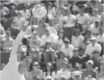  ?? TIM IRELAND/THE ASSOCIATED PRESS ?? Milos Raonic’s speedy serves outpowered Spain’s Daniel Gimeno-Traver at Wimbledon on Monday.