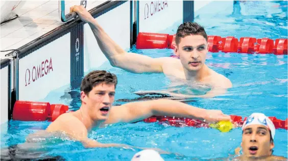  ?? Photo / Photosport ?? Lewis Clareburt (top) feels the pain of initially challengin­g for a medal before fading to seventh in the 400m individual medley at Tokyo.