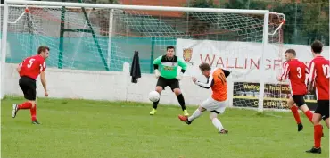  ??  ?? Sam Lawrence-Whiting curls towards goal