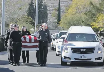  ?? Mark Lambie El Paso Times ?? THE CASKET of Border Patrol Agent Rogelio Martinez is carried into Our Lady of Guadalupe Church in El Paso for his funeral Saturday. Martinez died last weekend of his injuries, and his partner was seriously injured.