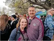  ?? OKLAHOMAN] [PHOTO BY ADAM KEMP, THE ?? Marla Cowherd, a vocal music teacher at Summit Middle School, and her husband Shane Cowherd, boys basketball coach at Edmond Memorial, have been out at the Capitol every day for the teacher walkout.