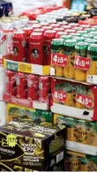  ?? ?? A report found prices surged faster than south of the border after the introducti­on of minimum pricing laws