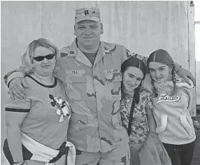  ??  ?? Alyssa Hill, third from left, with her mother, Dena Hill, father, Army National Guard Captain Raymond Hill, and sister BreeAnna Hill.