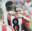  ??  ?? Bradley with Jermain Defoe.