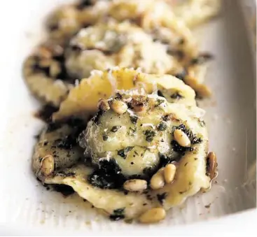  ?? Karen Warren / Houston Chronicle ?? Sweetbread­s-and-kale ravioli, brown butter, lemon, toasted pine nuts and Parmesan reggiano)