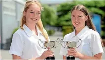  ?? SCOTT HAMMOND/STUFF ?? Year 11 student Kaylee Metcalfe, left, and year 12 student Milly Burfoot are named top students for their year groups.