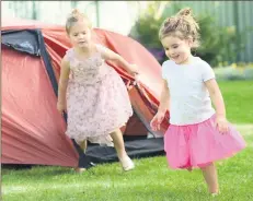  ??  ?? Something different: Why not camp in your own backyard with dad.