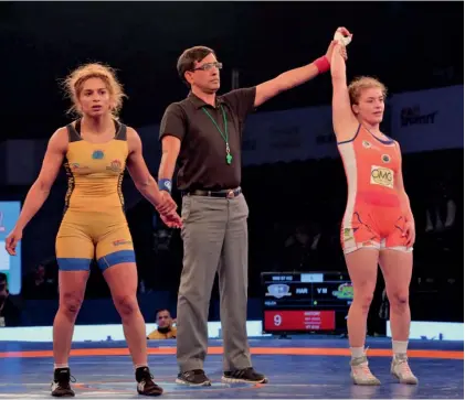  ??  ?? Haryana Hammers’ Helen Maroulis ( right) after her 9- 1 win over Veer Marathas’ Marwa Amri in their Pro Wrestling League match in New Delhi on Wednesday. The Hammers won 5- 2.