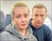  ?? REUTERS ?? Russian opposition politician Alexei Navalny and his wife Yulia on board a plane in Berlin, departing for Moscow.