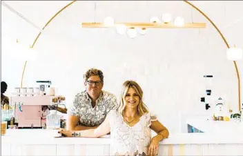  ?? ELAN STUDIOS ?? Mike and Jessica Anderson are the owners of Lovesong Coffee and Market in North Park.