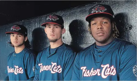  ?? NEW YORK TIMES FILE PHOTO ?? From left: Bo Bichette, Cavan Biggio and Vladimir Guerrero Jr. of the New Hampshire Fisher Cats pose before a game in Trenton, N.J., on April 10.