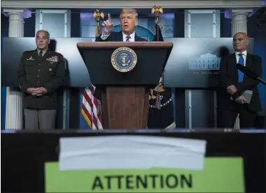  ?? ALEX BRANDON—ASSOCIATED PRESS ?? President Donald Trump speaks during a news conference in the James Brady Press Briefing Room of the White House, Friday, Sept. 18, 2020, in Washington, as Army Gen. Gustave Perna, who is leading Operation Warp Speed, and Dr. Moncef Slaoui, chief adviser to Operation Warp Speed, listen.