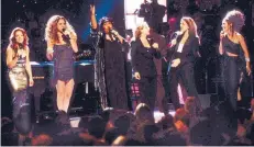  ??  ?? Leading lady: Aretha Franklin, third left, upstages Gloria Estefan, Mariah Carey, Carole King, Celine Dion and Shania Twain at the Divas Live concert in 1998
