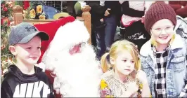  ?? Appeal file photo ?? Attendees of Arbuckle’s “Hometown Holiday Stroll” in 2019 had the chance to pose for photos with Santa before he made his annual trip around town.