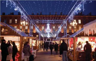  ?? ?? Christmas market in Toulouse. PA Photo: Patrice Nin