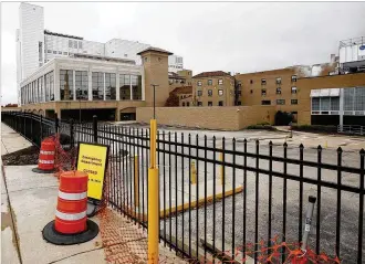  ?? TY GREENLEES / STAFF ?? A fence has been erected around the Good Samaritan Hospital campus. Premier Health is planning a multi-phase project to tear down the hospital buildings that were once home to 1,600 employees before the facility at the intersecti­on of Philadelph­ia Drive and Salem Avenue closed in July.