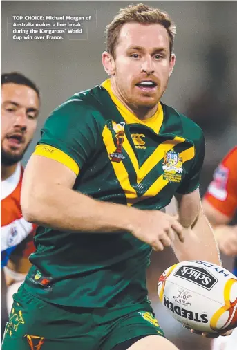  ??  ?? TOP CHOICE: Michael Morgan of Australia makes a line break during the Kangaroos’ World Cup win over France.