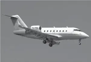  ?? CP PHOTO ?? In this May 20, 2016 photo, a Bombardier CL604 aircraft, with tail number TC-TRB, descends to land in Istanbul. The Turkish private jet flying from the United Arab Emirates to Istanbul carrying a group of young women crashed Sunday night. in a...