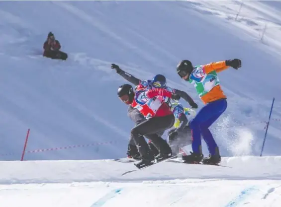  ??  ?? Nineteen-year-old Canadian snowboarde­r Éliot Grondin, left, has made a dramatic move up the World Cup standings by winning the first of two races in Bakuriani, Georgia on March 4.