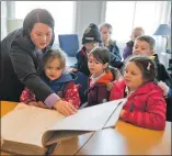  ?? Photograph: Abrightsid­e Photograph­y. Harry Potter. ?? Caol primary one and two pupils see how banking was recorded before computers. Some of the children said it looked like it was from