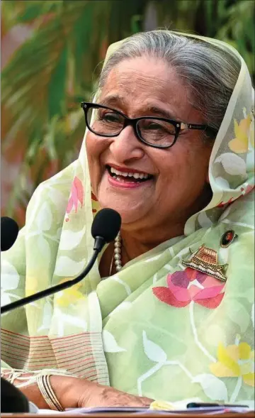  ?? ?? Bangladesh's premiermin­ister Sheikh Hasina tager hul på sin fjerde periode i traek som premiermin­ister i Bangladesh efter at have vundet parlaments­valget i søndags. Foto: Indranil Mukherjee/AFP