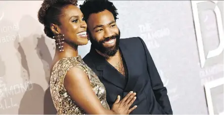  ?? EVAN AGOSTINI/INVISION/AP ?? Actress Issa Rae, left, and actor/rapper Donald Glover/Childish Gambino attend the 4th annual Diamond Ball. Rae hosted and Gambino performed at the event.