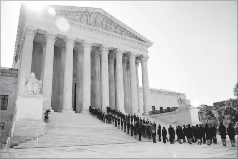  ?? MANUEL BALCE CENETA/AP PHOTO ?? The casket of late Supreme Court Justice John Paul Stevens is carried into the U.S. Supreme Court in Washington on Monday.